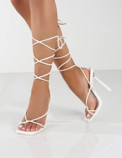 Lacey Wide Fit White PU Square Toe Strappy Lace Up Heels 8 Lacey Wide Fit White PU Square Toe Strappy Lace Up Heels -Chic Footwear Shop 0001 LACEY WHITE PU2 917f65f1 e492 4270 ba29 61fbe6b1e309