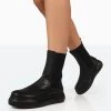 Pisa Black Pu Chunky Rubber Sole Chelsea Boots 2 Pisa Black Pu Chunky Rubber Sole Chelsea Boots -Chic Footwear Shop 1 05fe5bfa e717 4039 abdd 0ad8b4047b80