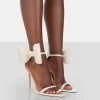 Zeal Wide Fit Off White Satin Strappy Bow Ankle Detail Stiletto Heels -Chic Footwear Shop 771A0652 cad45818 c4b8 409f 8b06 745d9981c1d6