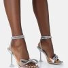 Glimmer Silver Holographic Perspex Wrap Around Diamante Bow Square Toe Heels 2 Glimmer Silver Holographic Perspex Wrap Around Diamante Bow Square Toe Heels -Chic Footwear Shop 771A4975 4aac9c5d 297b 439b 9487 ea5608843b42