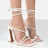 Lori White Strappy Lace Up Square Toe Heels